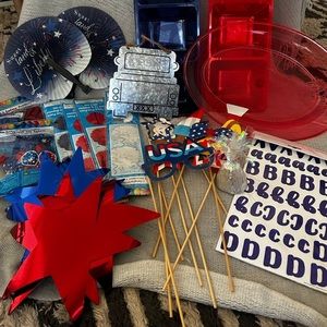 Assorted red, white, and blue party supplies